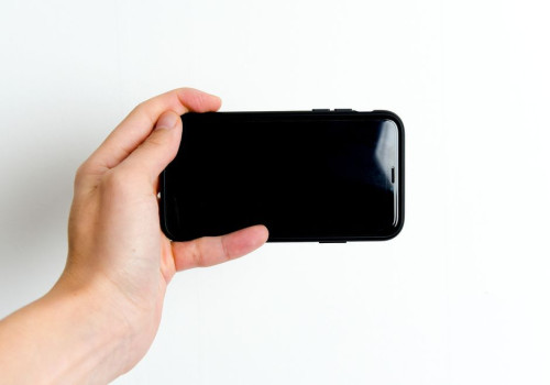 Waarom staat er 'SOS' naast de netwerkbalkjes op je iPhone in België?